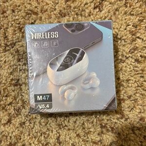 BRAND NEW ear cuff bluetooth headphones still in box never opened